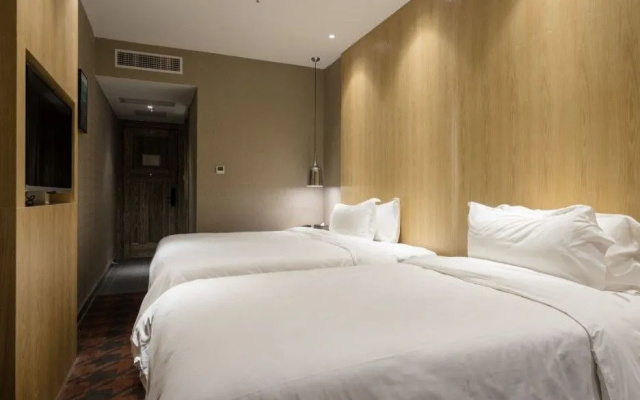 Pengxi Hotel (Shenzhen Pingshan High-Speed Railway Station Jinlong Subway Station)