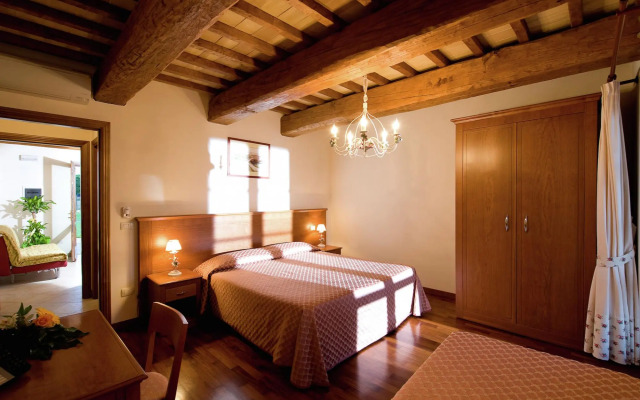 An agritourism complex with views of Assisi.