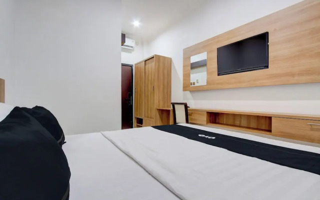 Capital O 93266 Palmier Hotel