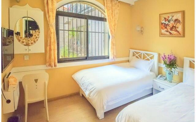 Отель Xiamen Gulangyu Sunshine Dora's House Китай, Сямынь - отзывы, цены и фото номеров - забронировать отель Xiamen Gulangyu Sunshine Dora's House онлайн комната для гостей