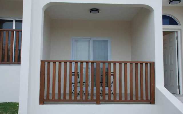 Отель Nianna Coral Bay Deluxe Townhouse вид на фасад