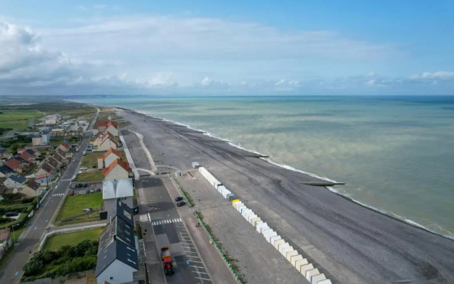 Face à la mer : appartement lumineux