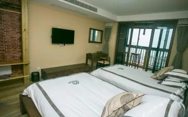 Qingnian Yuesha Holiday Apartment
