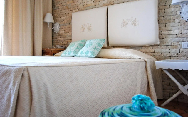 Sulia House Porto Rotondo, Curio Collection by Hilton
