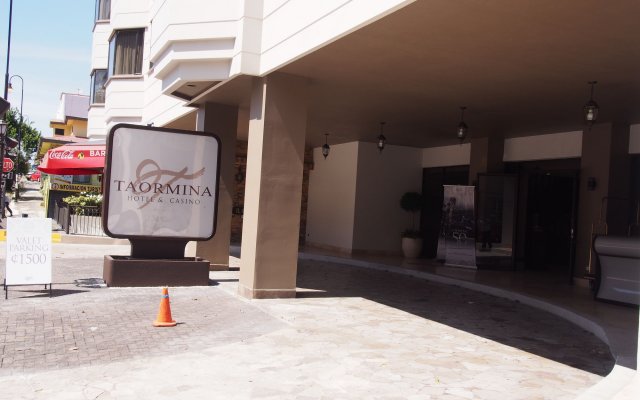 Отель Taormina Hotel and Casino Коста-Рика, Сан-Хосе - отзывы, цены и фото номеров - забронировать отель Taormina Hotel and Casino онлайн вид на фасад