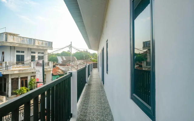 RedDoorz @ MG House Siantar Timur
