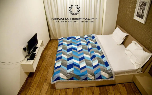Luxurious Studio Homes Nr Surat Airport by Nirvana Hospitality