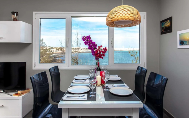 Coral Bay Beachfront Apartment by Vacanzy Collection