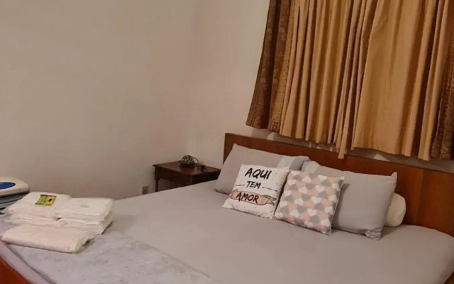 Apartamento aconchegante em condomínio encantador.