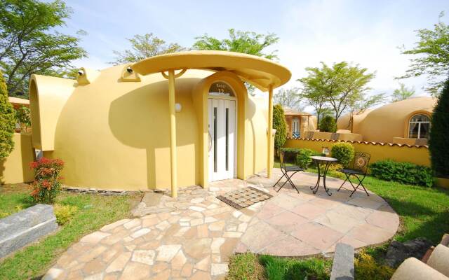 Отель Aso Farm Village Минамиогуни вид на фасад