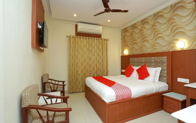 Capital O 14702 Kovilakam Residency