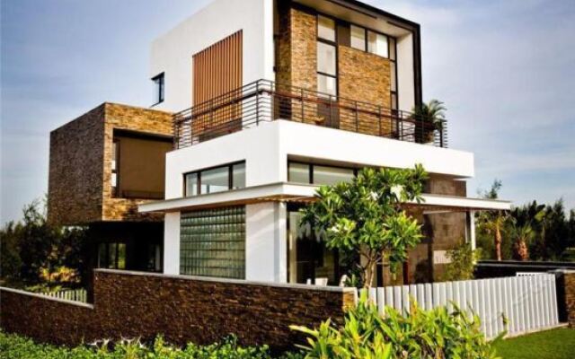 Отель Montgomerie Links Villas вид на фасад
