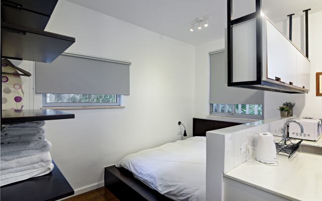 Апартаменты Hanasi 129 - Boutique Apartments Хайфа комната для гостей