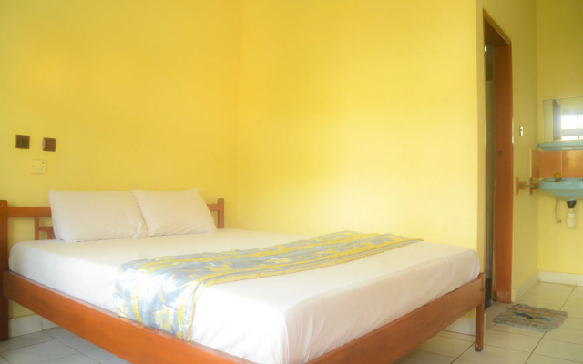 Super OYO 1654 Maha Bharata Kuta Inn