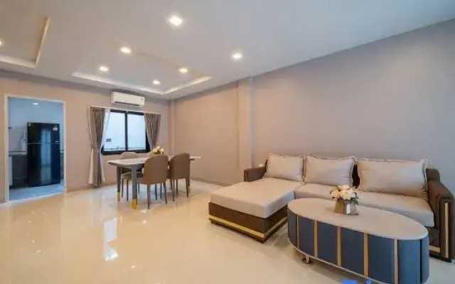 Master bedroom with a bathroom in a Pattaya villa.