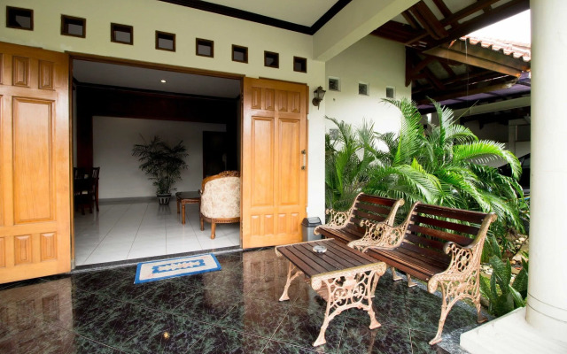 Santo Guest House by RedDoorz