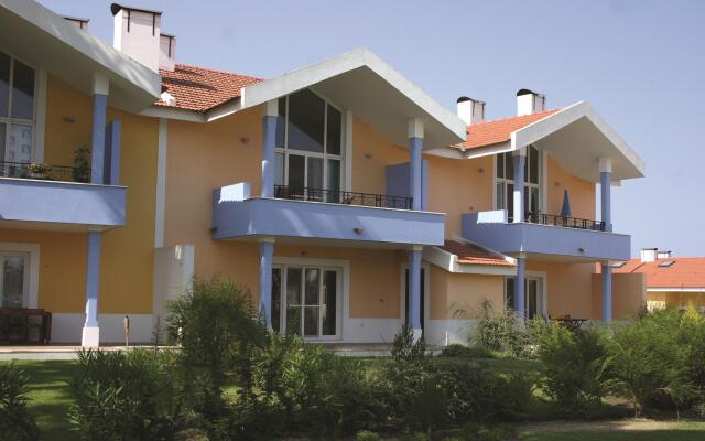 Отель Aldeamento Turistico Casas da Comporta вид на фасад
