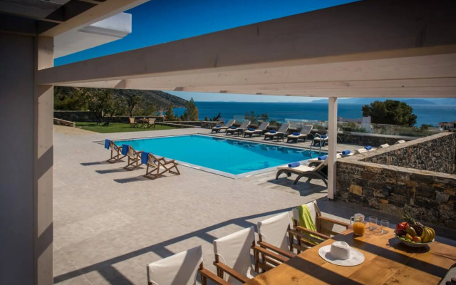 Villa Bellelen with a heated pool