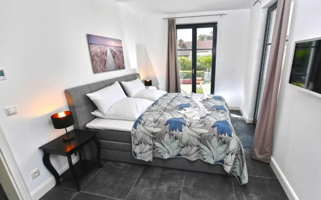 Villa "Levante" F659 Penthouse mit Kamin, Sauna, Seeblick