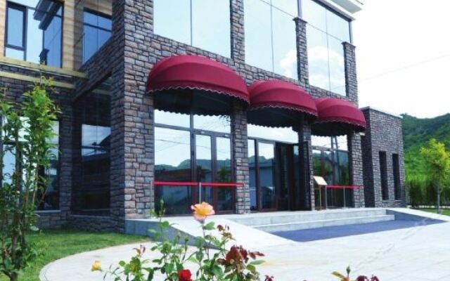 Отель Guo'ao Xiangju Changcheng Hotel Китай, Пекин - отзывы, цены и фото номеров - забронировать отель Guo'ao Xiangju Changcheng Hotel онлайн вид на фасад