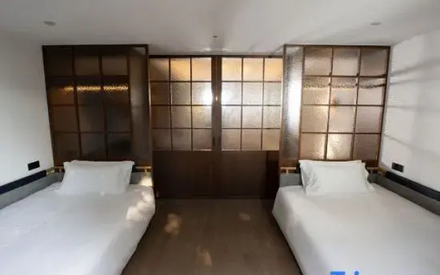 Yanguan Chaolezhicheng Shuishi Hotel