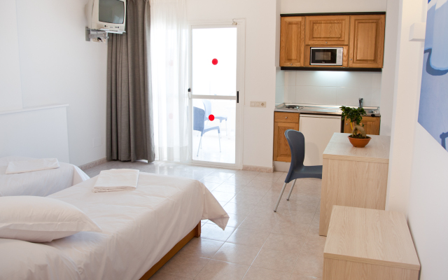 Отель Apartamentos Panoramic Испания, Ивиса - отзывы, цены и фото номеров - забронировать отель Apartamentos Panoramic онлайн комната для гостей