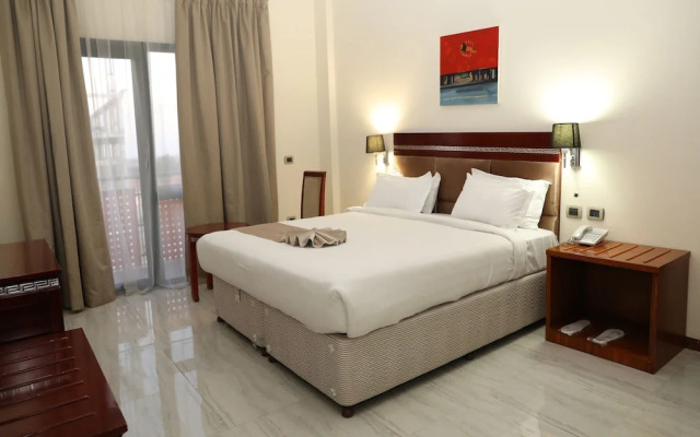 Kenenisa.. Oasis International Hotel