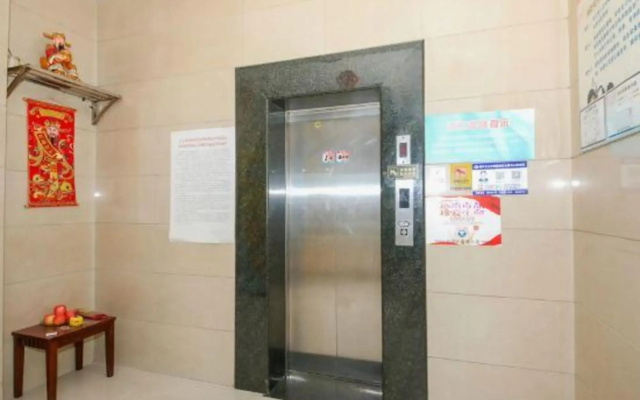 Paojiang Xinyuansu Business Hotel