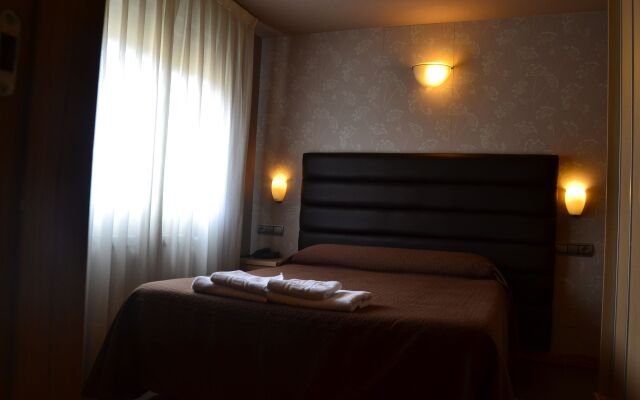 Отель Apartamentos Spa Cueto комната для гостей
