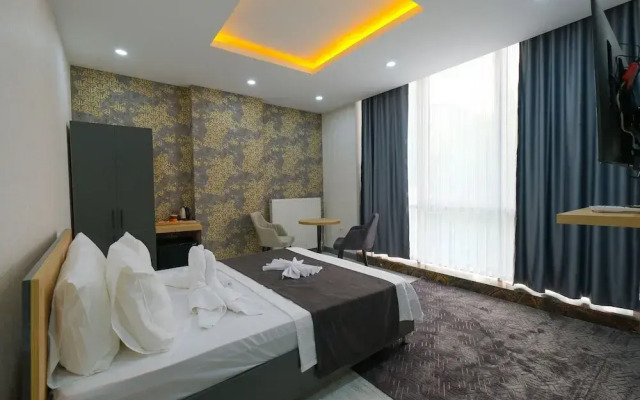 Minimalist Suit Otel