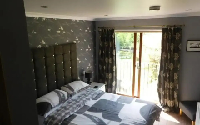 Riverside House