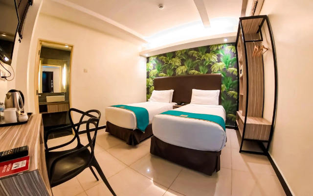 Lush Twin room (twin beds) · The Mesui Hotel — photo 3