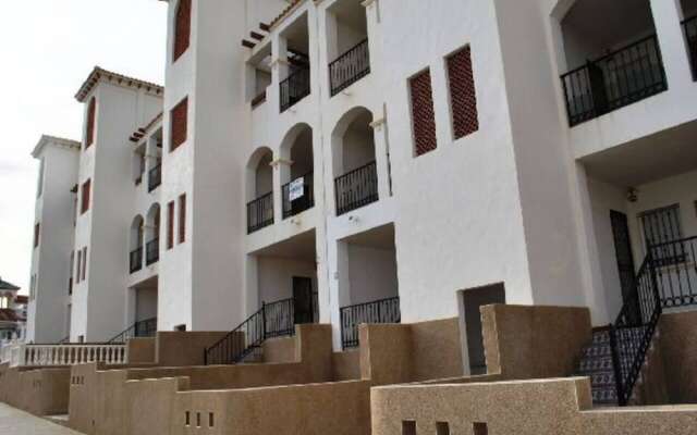 Отель La Cinuelica R14, 1st flr apt Overlook Pool L137 Испания, Ориуэла - отзывы, цены и фото номеров - забронировать отель La Cinuelica R14, 1st flr apt Overlook Pool L137 онлайн вид на фасад