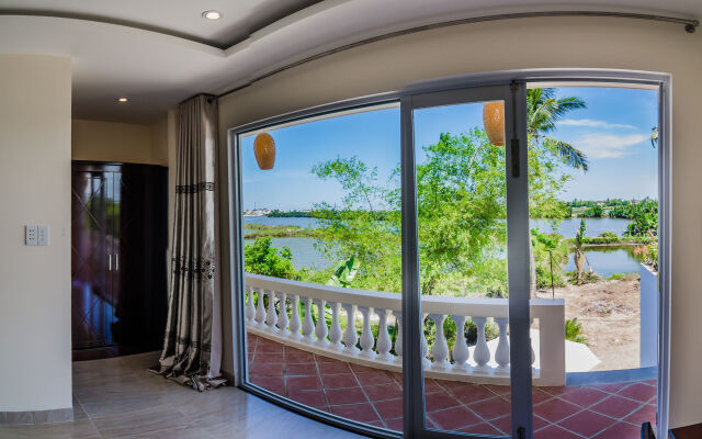 Отель The Moon River Homestay & Villa вид на фасад