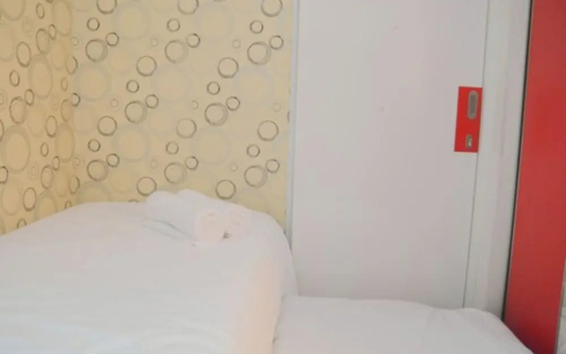 Homey and Relaxing 2BR Green Pramuka Apartment