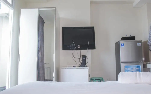 Homey Studio with City View Apartment @ Puri Orchard
