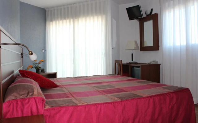 Hotel La Familia Gallo Rojo
