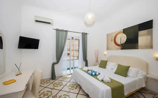 De Vivo Realty - The Colombo Positano