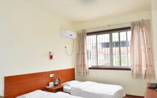 Warm Home Hotel (Nanyang Zhongjing Yinhe Times Square)