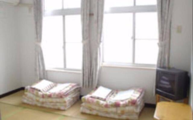 Отель Beppu Guest House Беппу вид на фасад