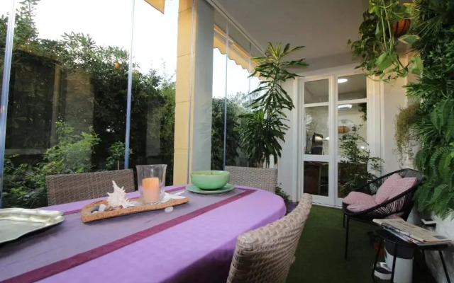 Cozy apt 10 mins walk from Poetto + terrace