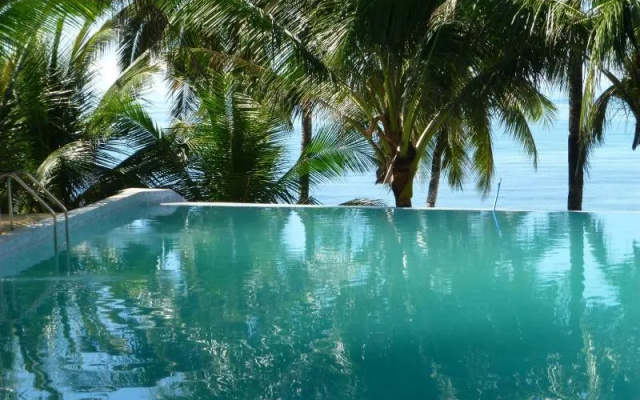 RedDoorz Premium @ Flower Beach Anda
