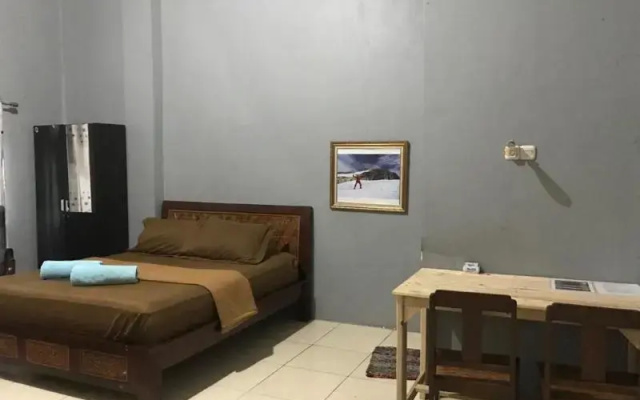 The Carstensz Homestay by ZUZU