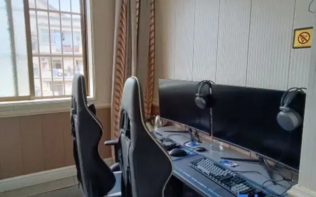 X9 E-sports Movie Homestay (Guanggu Plaza)
