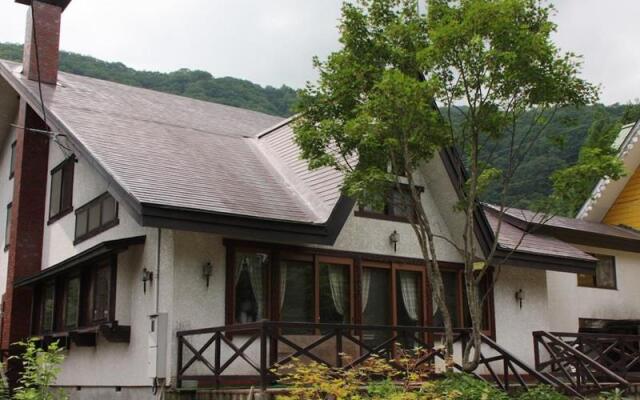 Отель Guest House Wind Inn Hakuba Хакуба вид на фасад