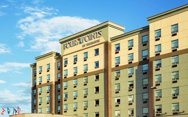 Отель Four Points by Sheraton Calgary Airport вид на фасад