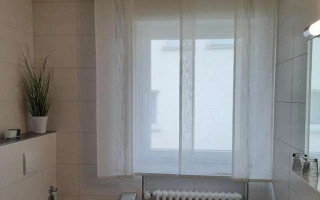 Ferienwohnung und Gästezimmer Iburgblick