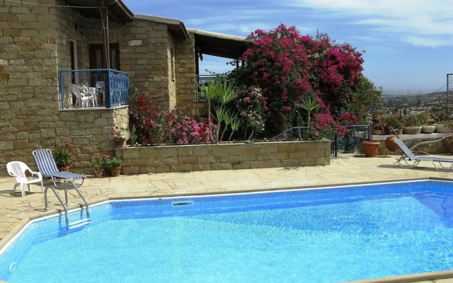 Adamos House