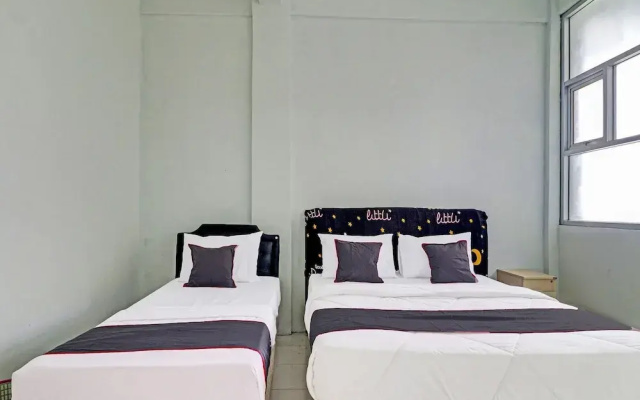 Capital O 91466 Hotel Neu Backpacker Tf Syariah (smk Tb)