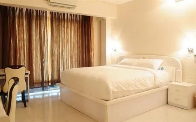 Astute Apartment